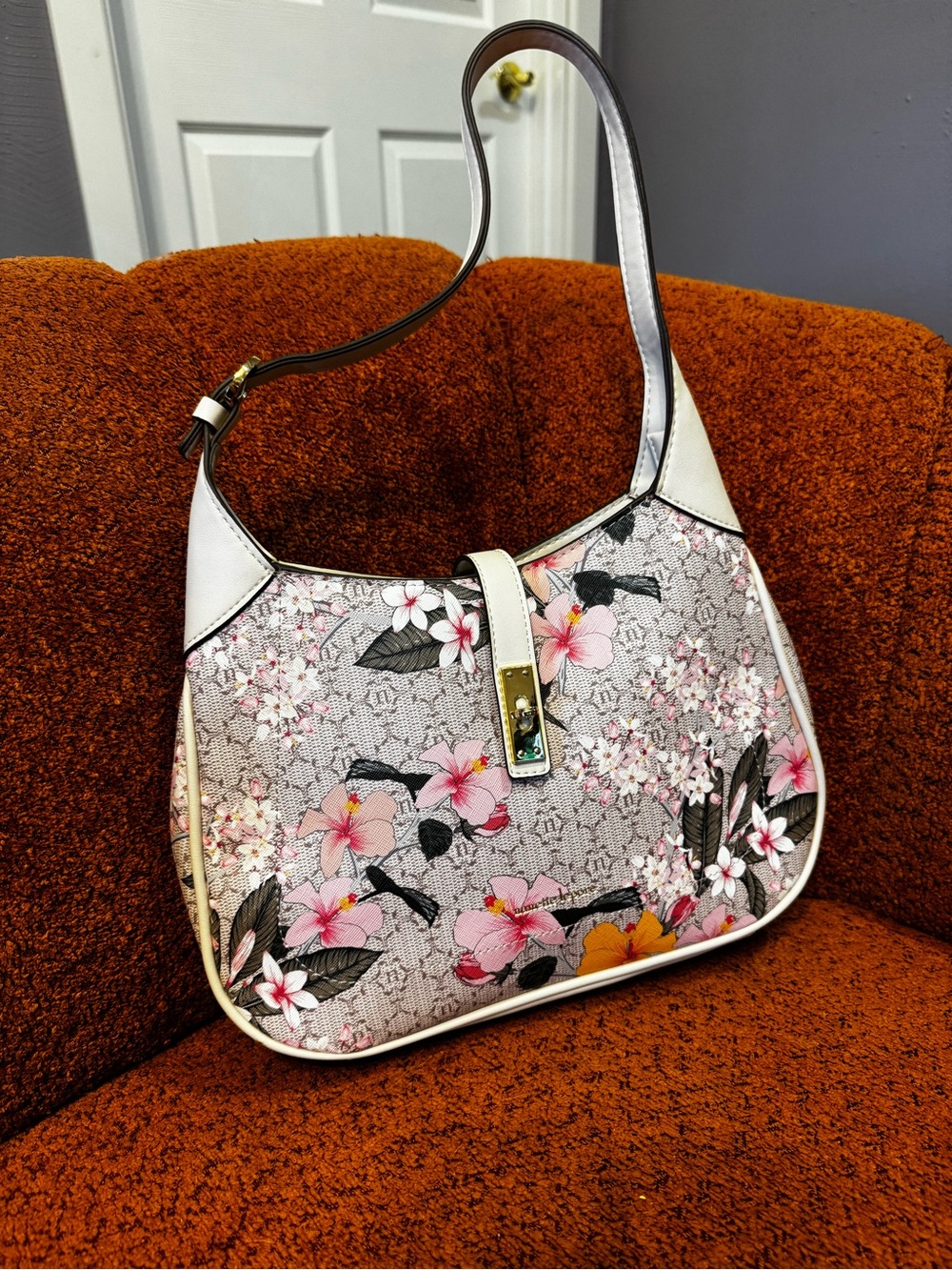 Nanette Lepore pink and beige floral hobo bag